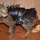 Illustration for article titled No Cat Is Complete Without A Set Of Leather Battle Armor